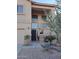 Two-story house entrance with decorative stone and landscaping at 44973 W Sandhill Rd, Maricopa, AZ 85139