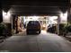 Garage with car, storage, and various items at 44973 W Sandhill Rd, Maricopa, AZ 85139