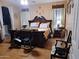 Spacious main bedroom with a large bed and plenty of room for extra furniture at 44973 W Sandhill Rd, Maricopa, AZ 85139