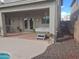 Inviting backyard oasis with a covered patio, hot tub, and sparkling pool at 44973 W Sandhill Rd, Maricopa, AZ 85139