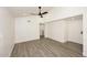 Spacious living area featuring hardwood floors and ceiling fan at 916 S Melody Ln, Tempe, AZ 85281