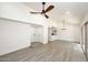 Open concept dining area with sliding glass doors and chandelier at 916 S Melody Ln, Tempe, AZ 85281