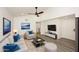 Bright living room with vaulted ceiling, comfy seating, and modern decor at 916 S Melody Ln, Tempe, AZ 85281