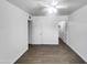 Spacious bedroom with tile floors and an adjacent closet at 2236 E Nancy Ln, Phoenix, AZ 85042