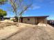 Ranch-style home with carport and spacious yard at 2236 E Nancy Ln, Phoenix, AZ 85042