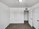 Bright bedroom with tile floors and a double door closet at 2236 E Nancy Ln, Phoenix, AZ 85042