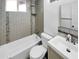Clean bathroom with a bathtub, toilet, and updated vanity at 2236 E Nancy Ln, Phoenix, AZ 85042