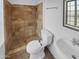 Bathroom with tile shower and vanity at 2342 W Danbury Rd, Phoenix, AZ 85023