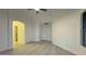 Bright bedroom with wood-look floors and ample closet space at 46137 W Starlight Dr, Maricopa, AZ 85139