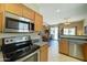 Kitchen features stainless steel appliances and light wood cabinets at 2101 S Meridian Rd # 204, Apache Junction, AZ 85120