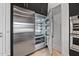 Stainless steel built-in refrigerator in a modern kitchen at 7147 E Wilderness Trl, Gold Canyon, AZ 85118