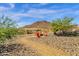 Relaxing fire pit area with seating, perfect for outdoor gatherings at 32269 N 133Rd Dr, Peoria, AZ 85383