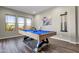 Game room featuring a pool table and large windows at 32269 N 133Rd Dr, Peoria, AZ 85383