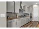 Modern kitchen with gas cooktop and ample cabinetry at 32269 N 133Rd Dr, Peoria, AZ 85383