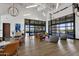 Modern community room with comfortable seating and large windows at 32269 N 133Rd Dr, Peoria, AZ 85383