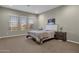 Spacious bedroom with carpeted floors and neutral decor at 32269 N 133Rd Dr, Peoria, AZ 85383