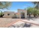 View of a home's exterior showcasing its Spanish-style architecture at 8633 E Via Montoya --, Scottsdale, AZ 85255