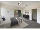 Main bedroom with sliding glass doors leading to a patio and ample closet space at 432 W Flame Tree Ave, San Tan Valley, AZ 85140