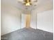 Spacious bedroom with plush carpeting and ample closet space at 432 W Flame Tree Ave, San Tan Valley, AZ 85140