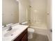 Simple bathroom with a shower/tub combo and vanity at 432 W Flame Tree Ave, San Tan Valley, AZ 85140