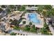 Community pool with surrounding landscaping and recreational areas at 16994 W Canterbury Dr, Surprise, AZ 85388