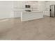 Modern kitchen, white cabinets, center island, stainless steel appliances at 37375 W Patterson St, Maricopa, AZ 85138