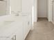 Modern bathroom featuring double sinks and tile flooring at 37375 W Patterson St, Maricopa, AZ 85138