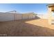 Large backyard with block wall and sandy ground at 37375 W Patterson St, Maricopa, AZ 85138