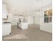Open concept kitchen with island and stainless steel appliances at 37375 W Patterson St, Maricopa, AZ 85138