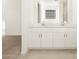 Elegant bathroom with double vanity and modern fixtures at 37375 W Patterson St, Maricopa, AZ 85138
