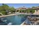 Luxury estate with stone exterior and lush landscaping at 19452 N 98Th Pl, Scottsdale, AZ 85255