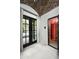 Walk in wine cellar with brick ceiling and arched entry at 19452 N 98Th Pl, Scottsdale, AZ 85255