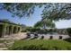 Inviting pool and spa with flagstone decking and lush landscaping at 19452 N 98Th Pl, Scottsdale, AZ 85255