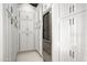 Spacious pantry with custom cabinetry and wine cooler at 19452 N 98Th Pl, Scottsdale, AZ 85255