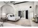 Luxurious Primary suite with a grand bed, plenty of light and sitting area at 19452 N 98Th Pl, Scottsdale, AZ 85255