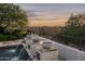 Tranquil water features and sunset views from the pool area at 19452 N 98Th Pl, Scottsdale, AZ 85255