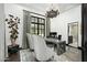 Bright home office with large windows and a view of the backyard at 19452 N 98Th Pl, Scottsdale, AZ 85255