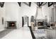 Grand living room with two fireplaces and high ceilings at 19452 N 98Th Pl, Scottsdale, AZ 85255