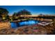 Luxury pool and patio with mountain views at 19452 N 98Th Pl, Scottsdale, AZ 85255
