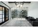 Impressive glass-enclosed wine cellar with ample storage for wine bottles at 19452 N 98Th Pl, Scottsdale, AZ 85255