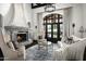 Living room features a fireplace and comfortable seating at 19452 N 98Th Pl, Scottsdale, AZ 85255