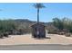 Gated community entrance with desert landscape at 26924 N 35Th Ln, Phoenix, AZ 85083