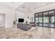 Open living area with sliding glass doors to backyard and modern decor at 12 E Quartz Rock Rd, Phoenix, AZ 85085