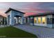 Luxury home with stone accents and a dramatic entryway at 12 E Quartz Rock Rd, Phoenix, AZ 85085