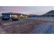 Large backyard with ample space, partially landscaped, and a view of the house at 12 E Quartz Rock Rd, Phoenix, AZ 85085
