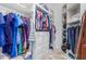 Large walk-in closet with ample shelving and hanging space at 12 E Quartz Rock Rd, Phoenix, AZ 85085