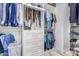 Well-organized walk-in closet with custom shelving at 12 E Quartz Rock Rd, Phoenix, AZ 85085