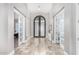 Elegant entryway with double doors and tiled floors at 12 E Quartz Rock Rd, Phoenix, AZ 85085