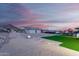 Spacious backyard with playground, artificial turf, and a view of the mountains at 12 E Quartz Rock Rd, Phoenix, AZ 85085