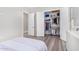 Comfortable bedroom with a walk-in closet and adjacent bathroom at 12 E Quartz Rock Rd, Phoenix, AZ 85085